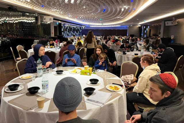   Jewish Ukrainian refugees celebrate Passover at Chabad center in Warsaw, Poland.  (photo credit: CHABAD POLAND)