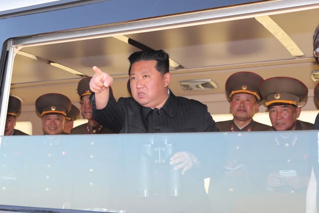  North Korean leader Kim Jong Un gestures as he watches the test-firing of a new-type tactical guided weapon according to state media, North Korea, in this undated photo released on April 16, 2022 by North Korea's Korean Central News Agency (KCNA). (photo credit: KCNA VIA REUTERS)