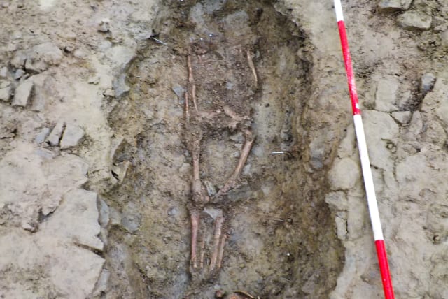  Romano-British burial with head placed at feet.