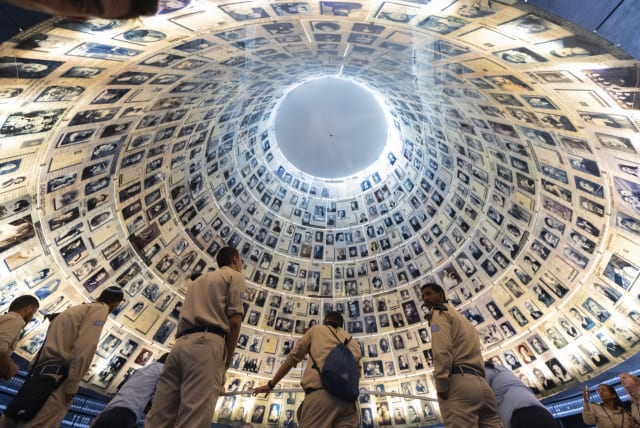  Visitors seen at the Yad Vashem Holocaust Memorial museum in Jerusalem on April 26, 2022, ahead of Israeli Holocaust Remembrance Day.  (photo credit: OLIVIER FITOUSSI/FLASH90)