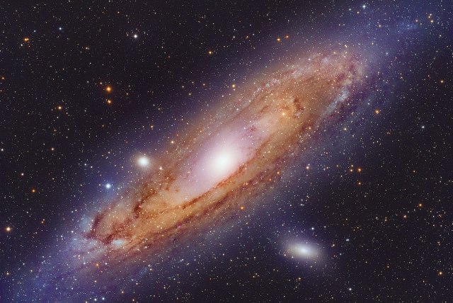  The Andromeda Galaxy is the nearest large spiral galaxy from the Earth, and contains within itself over a trillion stars.  (photo credit: Wikimedia Commons)