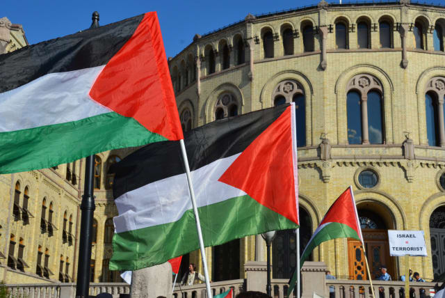  Palestinian flags in front of the Norwegian parliament Stortinget during a rally in 2014. (photo credit: Wikimedia Commons)