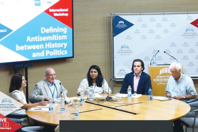  THE WRITER (left) and other panelists deliberate at the recent international workshop at the Van Leer Institute in Jerusalem.  (photo credit: Screenshot/Facebook )