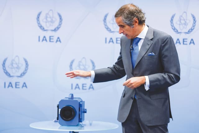  A SURVEILLANCE camera is displayed by IAEA Director-General Rafael Mariano Grossi at a news conference in Vienna, earlier this month. Grossi warned that it would be fatal to the Iran nuclear deal if Tehran didn’t reinstall cameras used by the IAEA to monitor nuclear acticvity.  (photo credit: REUTERS)