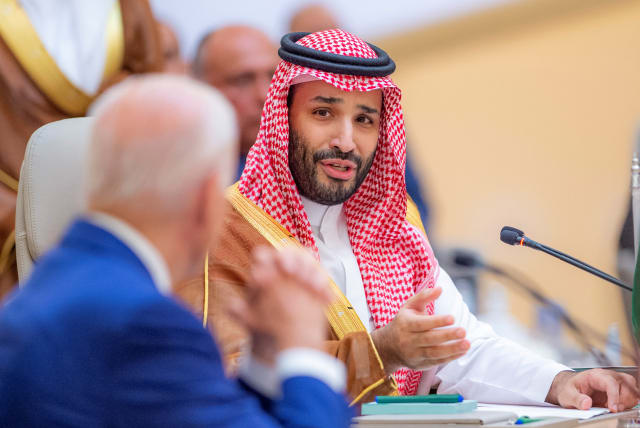  SAUDI CROWN Prince Mohammed bin Salman speaks to US President Joe Biden during the Jeddah Security and Development Summit, earlier this month.  (photo credit: BANDAR ALGALOUD/COURTESY OF SAUDI ROYAL COURT/REUTERS)
