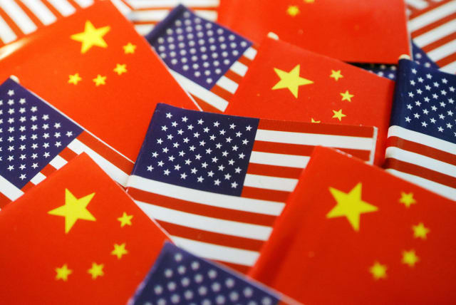 Flags of US and China are seen in this illustration picture taken August 2, 2022. (photo credit: REUTERS/FLORENCE LO/ILLUSTRATION)