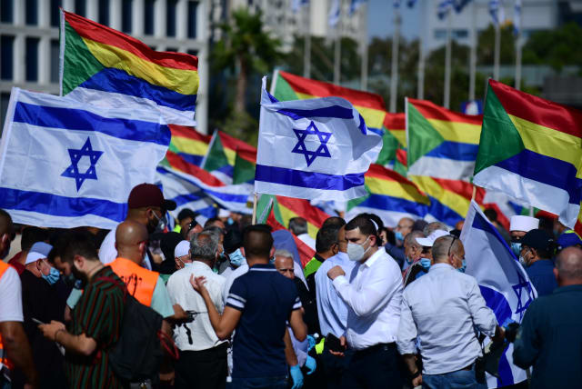  Members of the Druze community protest for the government financial support they were promised, at the Azrieli junction in Tel Aviv on May 10, 2020. (photo credit: TOMER NEUBERG/FLASH90)