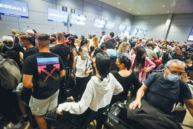  TRAVELERS AT the departure hall of Ben-Gurion Airport, during Passover in April.  (photo credit: FLASH90)