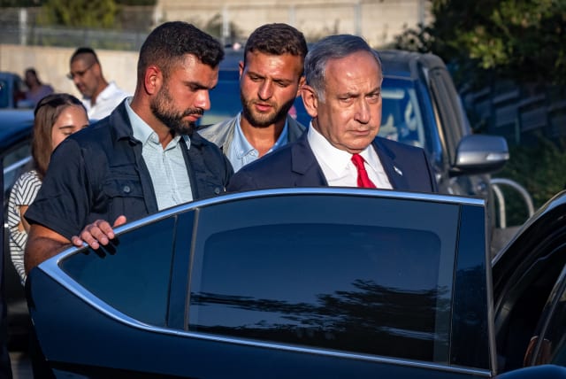  Then-opposition leader Benjamin Netanyahu seen entering a vehicle on August 29, 2022 (photo credit: OLIVIER FITOUSSI/FLASH90)