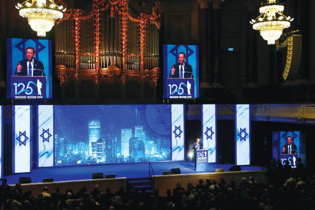  President Isaac Herzog addresses the event marking the 125th anniversary of the First Zionist Congress in Basel on August 29 2022. (photo credit: Arnd Wiegmann/Reuters)