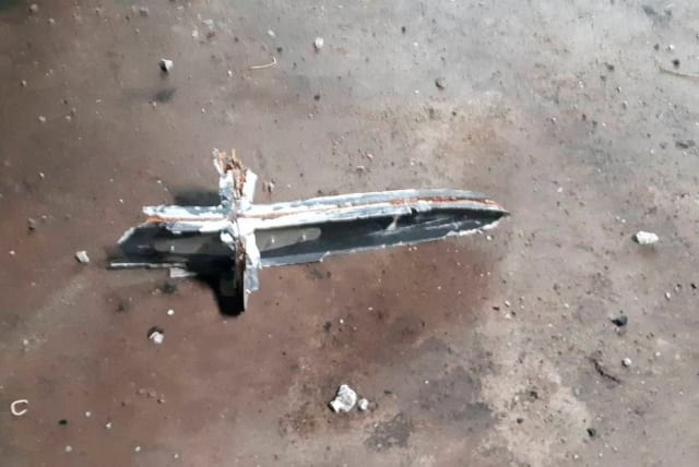  A part of an unmanned aerial vehicle, what Ukrainian military authorities described as an Iranian made suicide drone Shahed-136 and which was shot down near the town of Kupiansk, amid Russia's attack on Ukraine, is seen in Kharkiv region, Ukraine, in this handout picture released September 13, 2022 (photo credit: THE STRATEGIC COMMUNICATIONS DIRECTORATE OF THE UKRAINIAN ARMED FORCES/HANDOUT VIA REUTERS)