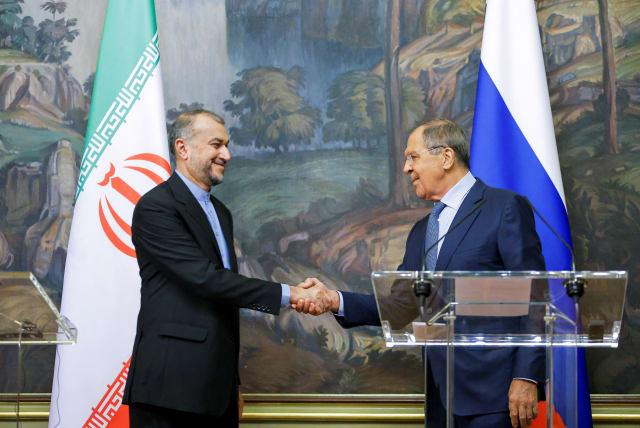  Russian Foreign Minister Sergei Lavrov shakes hands with Iranian Foreign Minister Hossein Amir-Abdollahian during a joint news conference in Moscow, Russia August 31, 2022. (photo credit: REUTERS/MAXIM SHEMETOV/POOL)