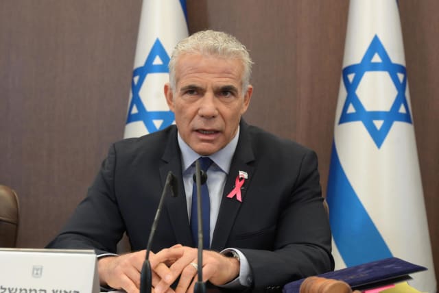  Prime Minister Yair Lapid at a cabinet meeting on 10/02/2022. (photo credit: AMOS BEN GERSHOM/GPO)