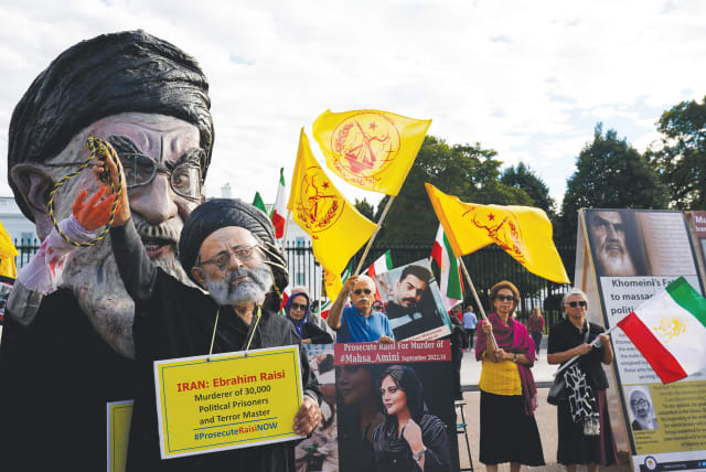  IRANIAN AMERICANS, including two people dressed up as Iranian Supreme Leader Ayatollah Ali Khamenei and President Ebrahim Raisi, rally outside the White House, last month, in support of anti-regime protests in Iran following the death of Mahsa Amini.  (photo credit: Elizabeth Frantz/Reuters)