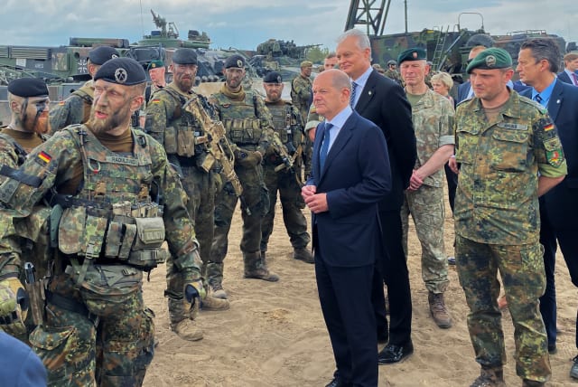  PREVIEW German Chancellor Olaf Scholz and Lithuanian President Gitanas Nauseda visit German troops of the NATO enhanced Forward Presence Battlegroup in Pabrade, Lithuania June 7, 2022. Picture taken June 7, 2022. (photo credit: REUTERS/Andreas Rinke)