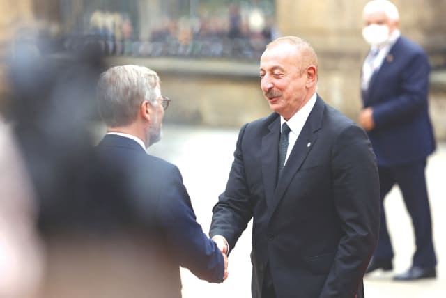  AZERBAIJANI PRESIDENT Ilham Aliyev (right) is welcomed by Czech Prime Minister Petr Fiala at an EU summit in Prague in October 2022. (photo credit: Eva Korinkova/Reuters)