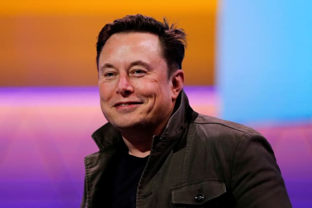 SpaceX owner and Tesla CEO Elon Musk smiles at the E3 gaming convention in Los Angeles, California, US, June 13, 2019. (photo credit: REUTERS/MIKE BLAKE/FILE PHOTO)