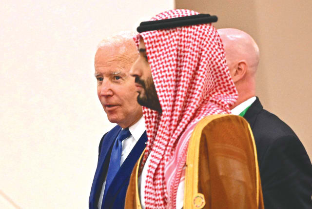  US PRESIDENT Joe Biden and Saudi Crown Prince Mohammed bin Salman walk side by side at a Gulf Cooperation Council meeting in Jeddah, Saudi Arabia, earlier this year.  (photo credit: MANDEL NGAN/REUTERS)