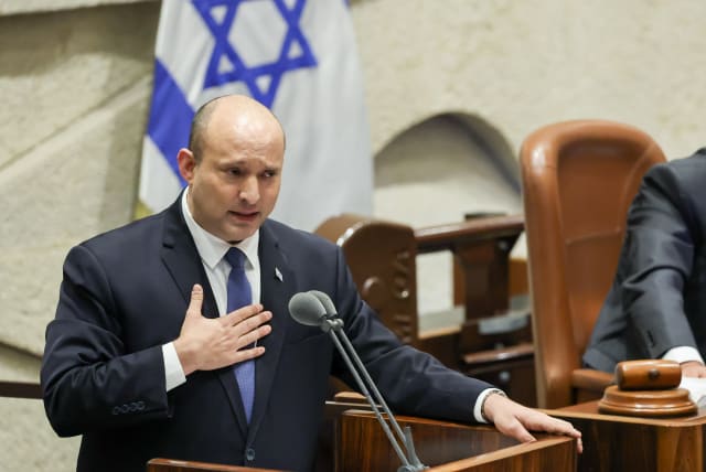  Former prime minister Naftali Bennett adresses the Israeli parliament during a "40 signatures debate" in the plenum hall of the Israeli parliament, on June 13, 2022. Photo by Yonatan Sindel/FLASH90 (photo credit: YONATAN SINDEL/FLASH 90)