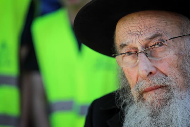  Rabbi Zvi Thau attends the "Yeshivot March" to call for the strengthening of Jewish identity in the State of Israel against the Conversion Law and Kashrut Law on January 30, 2022 in Jerusalem. (photo credit: OLIVIER FITOUSSI/FLASH90)
