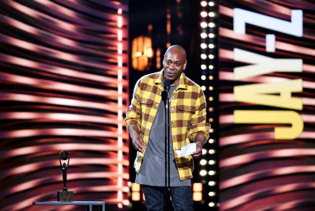  Dave Chappelle introduces Jay-Z during the Rock and Roll Hall of Fame induction ceremony in Cleveland, Ohio, US October 30, 2021. (photo credit: REUTERS/Gaelen Morse)