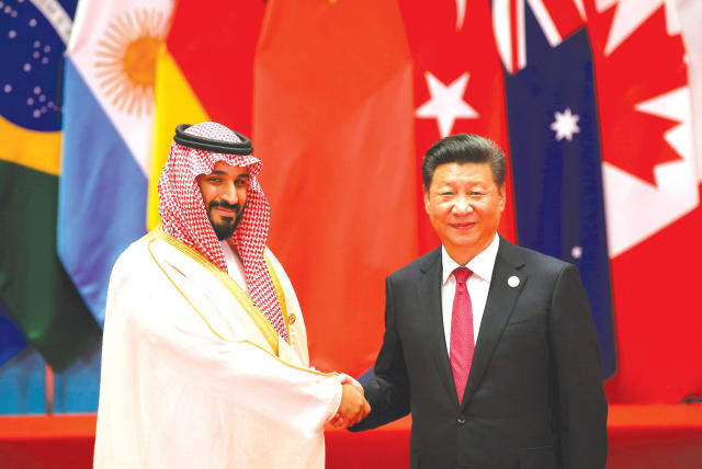  CHINESE PRESIDENT Xi Jinping meets with then-Saudi deputy crown prince Mohammed bin Salman during the G20 Summit in Zhejiang province, China, in 2016. (photo credit: Damir Sagolj/Reuters)