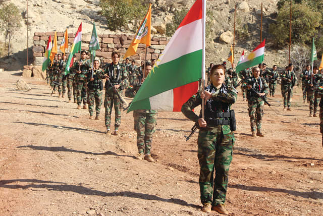  PAK FIGHTERS at their base in Pirde, Kirkuk Province.  (photo credit: JONATHAN SPYER)
