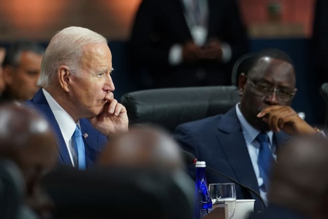  U.S. President Joe Biden and Senegalese President Macky Sall (R) listen to remarks during the U.S.-Africa Summit Leaders Session on partnering on the African Union’s Agenda 2063, in Washington, U.S., December 15, 2022. (photo credit: KEVIN LAMARQUE/REUTERS)