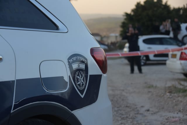 Police operate at a crime scene in Nazareth, December 2022. (photo credit: AVSHALOM SASSONI/MAARIV)