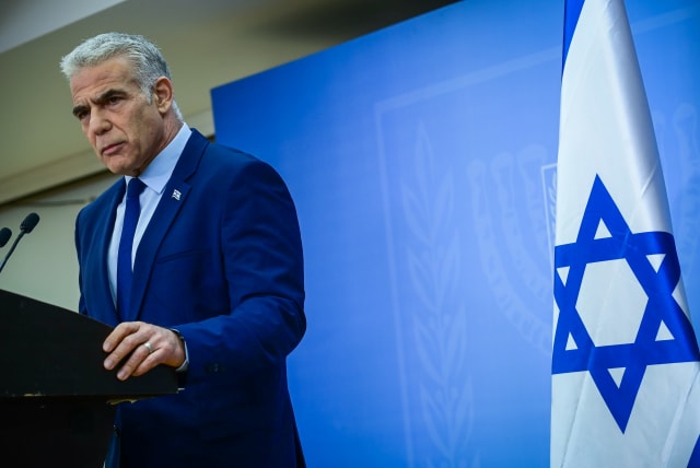  Yair Lapid holds a press conference in Tel Aviv on December 22, 2022.  (photo credit: TOMER NEUBERG/FLASH90)