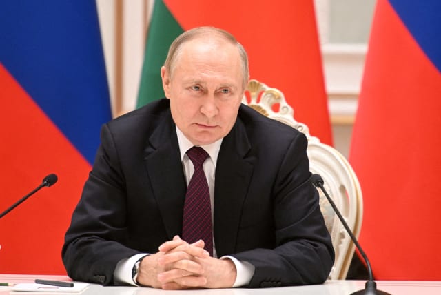  Russian President Vladimir Putin attends a news conference in Minsk, Belarus December 19, 2022. (photo credit: SPUTNIK/PAVEL DENYAKOV/KREMLIN via REUTERS/FILE PHOTO)