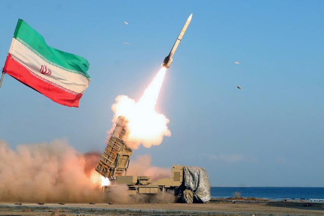  A missile is launched during an annual drill in the coastal area of the Gulf of Oman and near the Strait of Hormuz, Iran (photo credit: REUTERS)