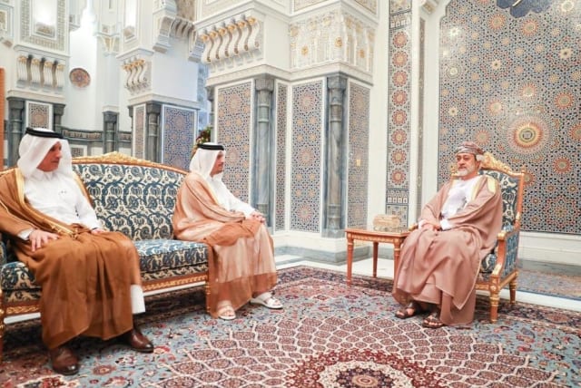  Omani Sultan Haitham bin Tarik al-Said, right, meets with Omani Foreign Minister Mohammed bin Abdulrahman Al-Thani in Muscat, Oman, May 21, 2020. (photo credit: Qatari Foreign Ministry/Handout/Anadolu Agency via GETTY IMAGES)