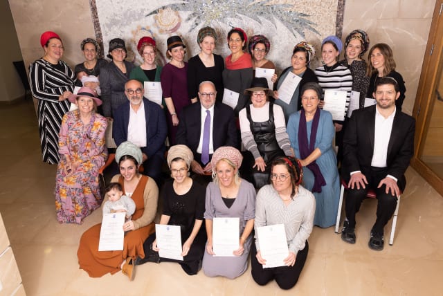  Standing and on the floor are the women who took the exam. In the middle row, heads of Ohr Torah Stone and Matan Sharon (photo credit: JARED BERNSTEIN)
