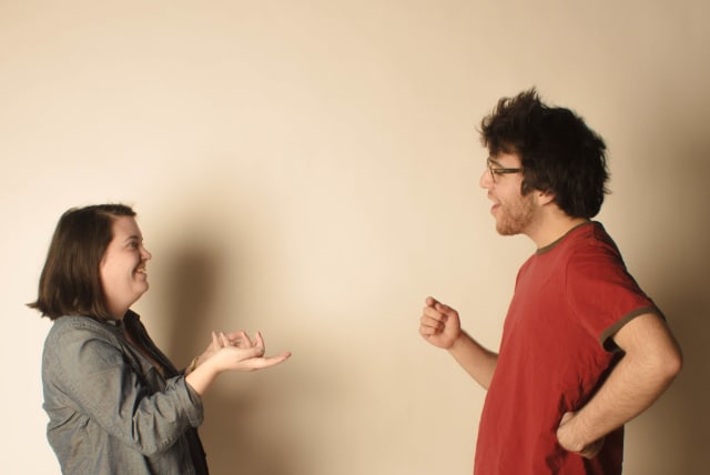  Two young people demonstrating a lively conversation. (photo credit: Wikimedia Commons)