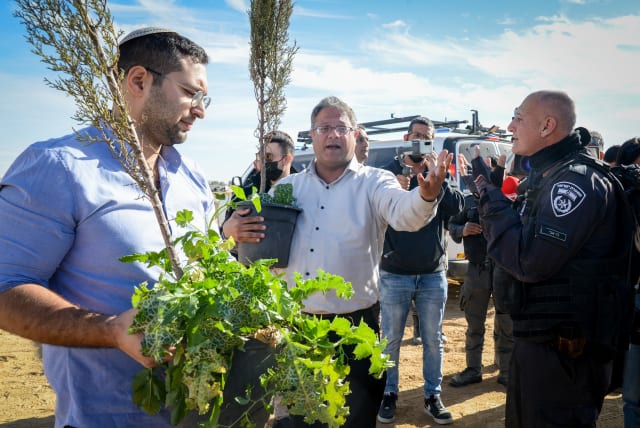 MK Itamar Ben-Gvir plant a tree outside the Bedouin village of al-Atrash in the Negev desert, southern Israel, January 12, 2022. (photo credit: FLASH90)