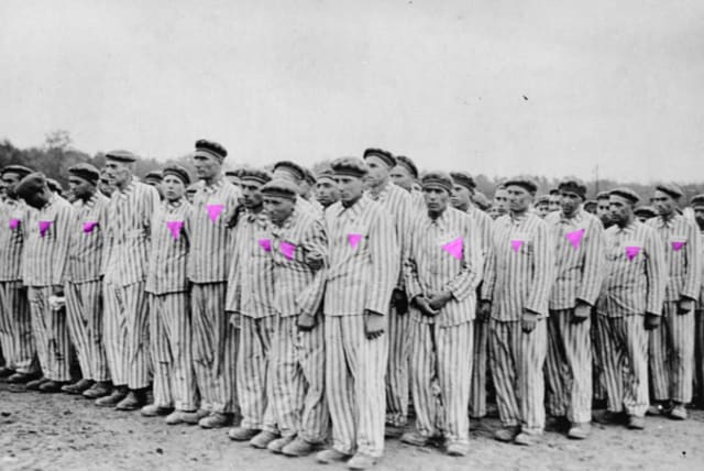  Colorized image of gay prisoners standing for role-call at Buchenwald Concentration Camp during the Holocaust. (photo credit: Wikimedia Commons)