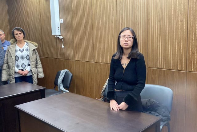  US citizen Alicia Day, detained for walking a calf, that she said she had bought to save from slaughter, in Red Square, attends a court hearing in Moscow, Russia February 1, 2023 (photo credit: Tverskoy District Court of Moscow/Handout via REUTERS )