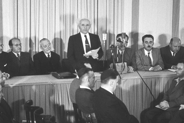  ISRAEL’S FOUNDING fathers declare the establishment of the state with the Declaration of Independence. (photo credit: KNESSET)