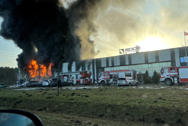  A view shows a fire at the Edge Autonomy drone factory in Marupe, Latvia, February 7, 2023, in this picture obtained from social media. (photo credit: ANDIS AGARELOVS/VIA REUTERS)