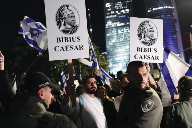  PROTESTERS AGAINST the current government and the planned reforms rally in Tel Aviv on January 28.  (photo credit: TOMER NEUBERG/FLASH90)