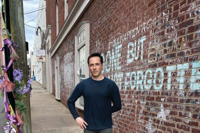  THE WRITER visits Charlottesville. On the wall, it reads: ‘It can happen again – gone but not forgotten.’ (photo credit: YUVAL DAVID)