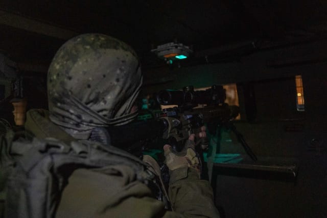  IDF forces during the operation of arresting two terrorist suspected of killed IDF Staff-Sgt. Ido Baruch in October (photo credit: IDF SPOKESPERSON UNIT)