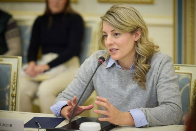  Canadian Foreign Minister Melanie Joly attends a meeting with Ukraine's President Volodymyr Zelenskiy, amid Russia's attack on Ukraine, in Kyiv, Ukraine February 14, 2023. (photo credit: Ukrainian Presidential Press Service/Handout via REUTERS)