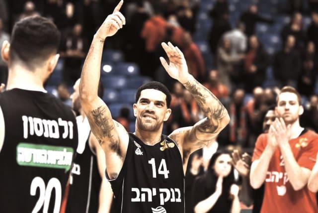   JAMES FELDEINE enjoyed many highlights in his stint with Hapoel Jerusalem, including a pair of State Cups wearing his favorite black jerseys, as in this 2020 picture. (photo credit: Dov Halickman)