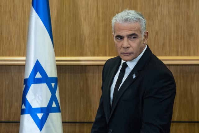  Yesh Atid head MK Yair Lapid speaks during a joint press conference of leaders of the opposition parties, in the Israeli Knesset, in Jerusalem, on February 13, 2023. (photo credit: YONATAN SINDEL/FLASH90)