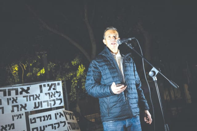  THE WRITER addresses a right-wing-led protest against the government, in Jerusalem, on Saturday night. (photo credit: YONATAN SINDEL/FLASH90)