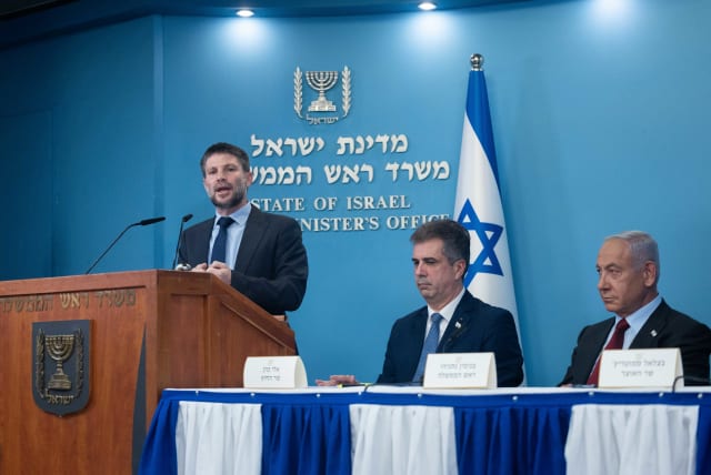  Israeli prime minister Benjamin Netanyahu, Minister of Finance Bezalel Smotrich and Minister of Foreign Affairs Eli Cohen at a press conference, at the Prime Minister's office in Jerusalem, on January 25, 2023.  (photo credit: YONATAN SINDEL/FLASH90)