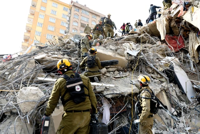  Members of an IDF team search for earthquake survivors in Kahramanmaras, Turkey, on February 10. (photo credit: RONEN ZVULUN/REUTERS)
