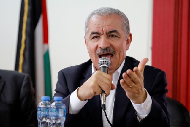Palestinian Prime Minister Mohammad Shtayyeh speaks as he visits after Israeli settlers' rampage in Hawara in the West Bank, March 1, 2023 (photo credit: REUTERS/RANEEN SAWAFTA)